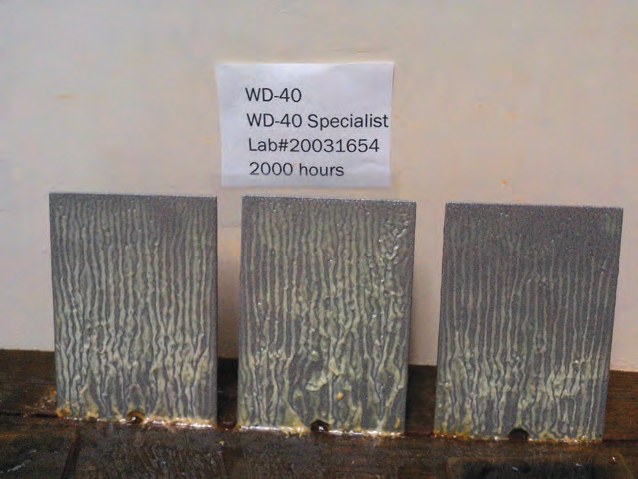Steel panels coated with WD-40 Specialist Corrosion Inhibitor after 2,000 hours in a salt spray chamber (ASTM B117). Independent test by Petro-Lubricant Laboratories.