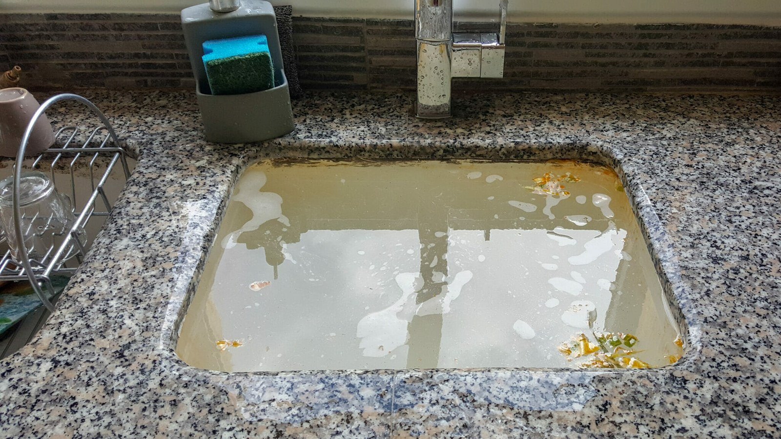 How to clean a sink or basin drain trap