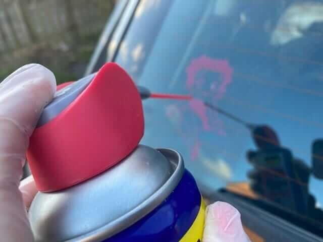Warm the adhesive with a hairdryer