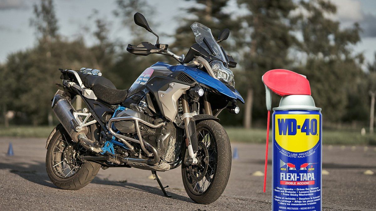 Soften the adhesive with WD-40