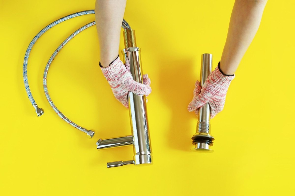 Remove the old sink mixer