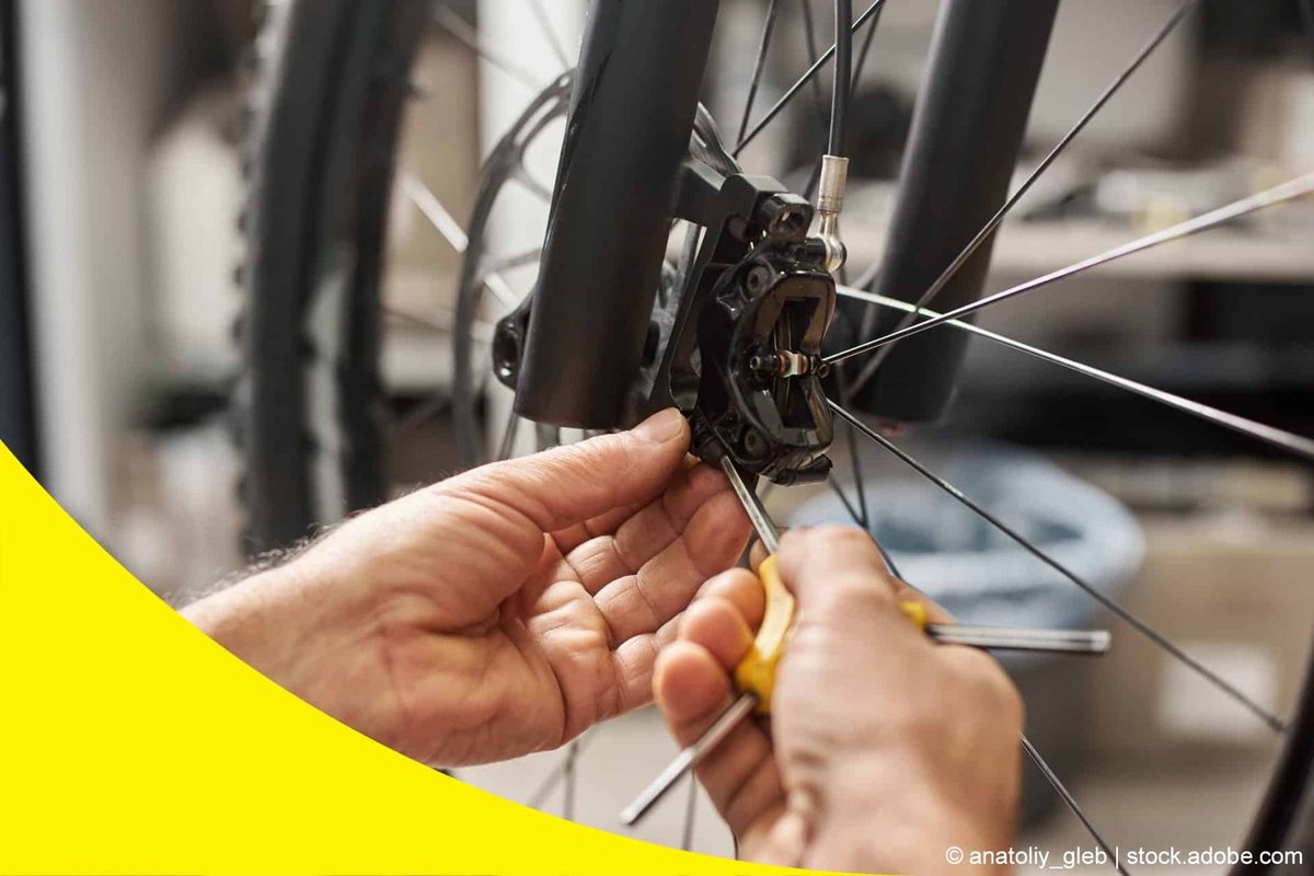 Remove the wheel and reach the calliper